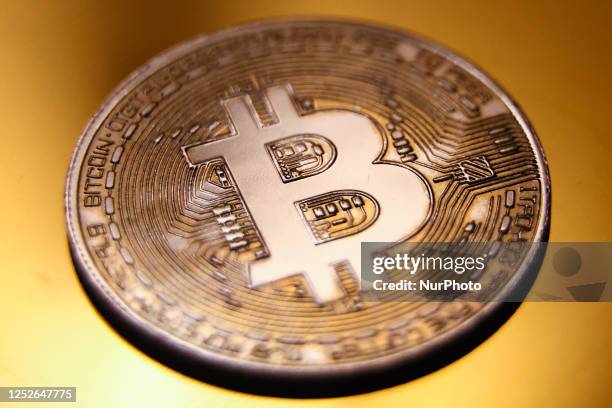 Bitcoin cryptocurrency physical representation is photographed for illustration photo in Krakow, Poland on May 4, 2023.