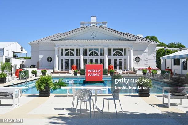 Clubhouse pool is seen with Wells Fargo floating signage during the first round of the Wells Fargo Championship at Quail Hollow Club on May 4, 2023...