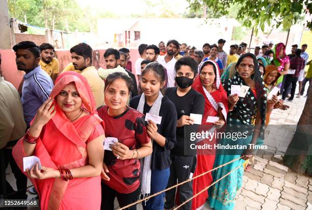 Women voters standing in queue to cast their votes during the local bodies election at Bikamau Bhawanipur polling booth Baxi ka Talaab on May 4, 2023...