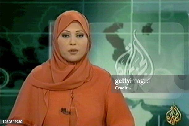 This TV grab shows Algerian presenter Khadija Ben Guenna reading the news on Al-Jazeera channel 24 November 2003. The Muslim star presenter of the...