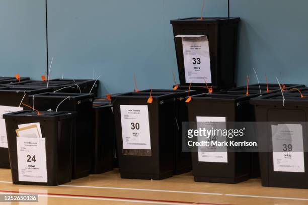 Unopened ballot boxes are pictured at the local election count for the Royal Borough of Windsor and Maidenhead on 4 May 2023 in Maidenhead, United...