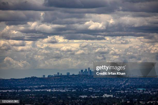 View of Los Angeles skyline, on a cloudy and rainy day from top of Forest Lawn in West Covina, CA.