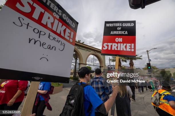 People picket outside of Paramount Pictures studios during the Hollywood writers strike on May 4, 2023 in Los Angeles, California. Scripted TV...