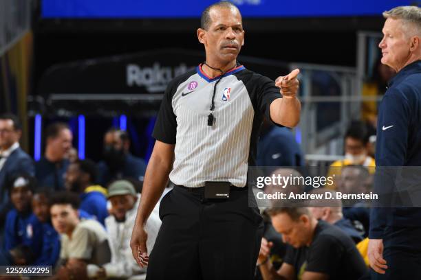 Referee Eric Lewis looks on during the game between the Los Angeles Lakers and the Golden State Warriors during the Western Conference Semi Finals of...