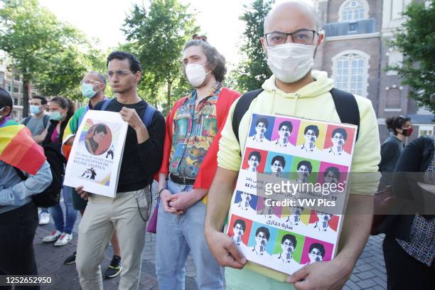 Activists and supporters of the GLBTQÊcommunity attend the remembrance stand in memory of the Sarah Hegaziat at the Homomonument amid the Coronavirus...