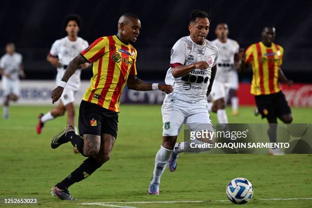 Deportivo Pereira's forward Arley Rodriguez vies for the ball during the Copa Libertadores group stage first leg football match between Colombia's...