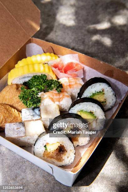An assortment of sushi offered at Sakae Sushi on Thursday, April 20, 2023 in Gardena, CA. The menu includes: Tamago-maki, Ebi, California roll,...