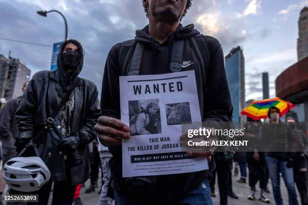 Protestors gather at Barclays Center Arena and march to the 7th police precinct to protest the NYPD's response to the killing of Jordan Neely in...