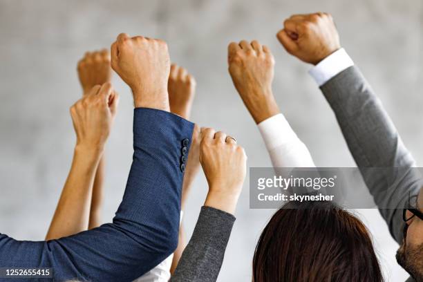 raise your hands in protest! - greve imagens e fotografias de stock