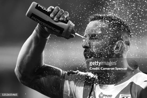 Paul Vaughan of the Dragons sprays water on his face during the round seven NRL match between the Sydney Roosters and the St George Illawarra Dragons...