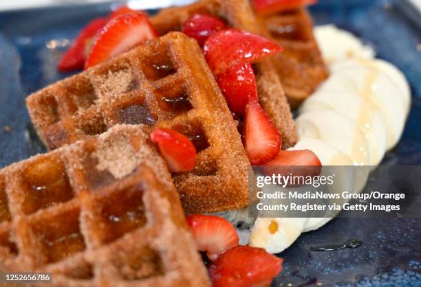 Huntington Beach, CA Crispy churro waffle tossed In cinnamon sugar with maple syrup and whipped butter at Sammy Hagar's new Cabo Wabo Beach Club...