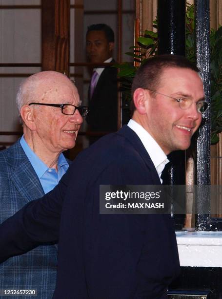 The chief executive of News Corp. In Europe and Asia, James Murdoch , escorts his father Rupert Murdoch, chairman of News Corp., on July 10, 2011 in...