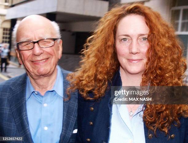 Rebekah Brooks Chief Executive of News International and Rupert Murdoch Chairman of News Corporation leave from his London residence shortly after...