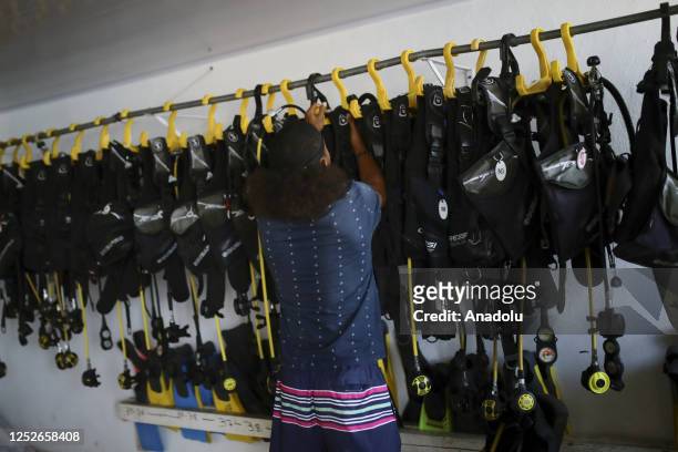 Diver hangs equipment at cabin in Providencia, Colombia on April 19, 2023. Located in the Colombian Caribbean Sea, is the second largest in the...