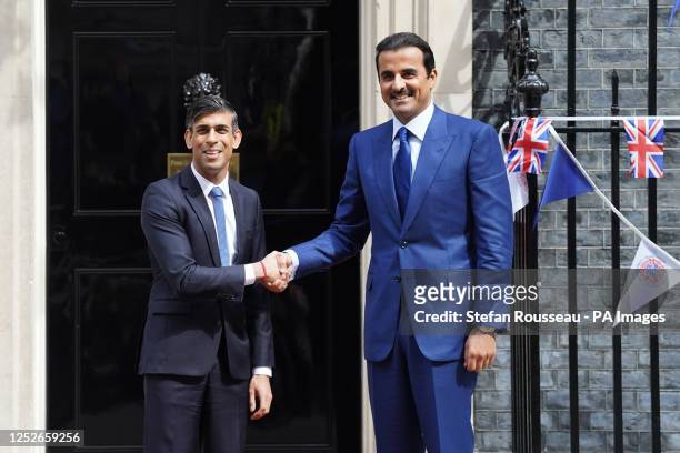 Prime Minister Rishi Sunak greets the Emir of Qatar, Sheikh Tamim ibn Hamad Al Thani, outside 10 Downing Street, London. Picture date: Friday May 5,...