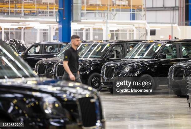 Newly manufactured TX electric London black cabs on the final assembly line at the London EV Co. Manufacturing plant in Coventry, UK, on Thursday,...