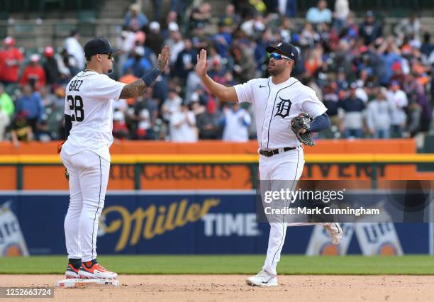 Javier Baez and Riley Greene of the Detroit Tigers high-five to celebrate the victory against the New York Mets at Comerica Park on May 4, 2023 in...