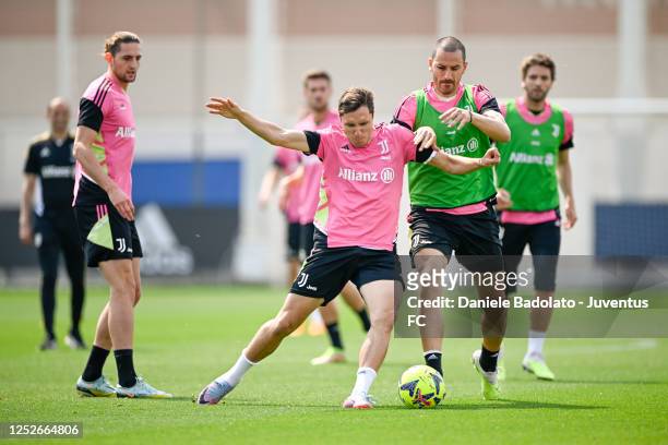 Federico Chiesa, Leonardo Bonucci of Juventus during a training session at JTC on May 5, 2023 in Turin, Italy.