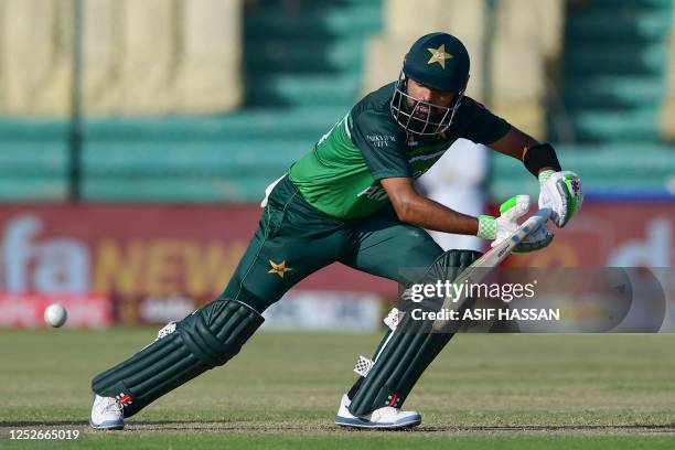 Pakistan's Babar Azam plays a shot during the fourth one-day international cricket match between Pakistan and New Zealand at the National Cricket...