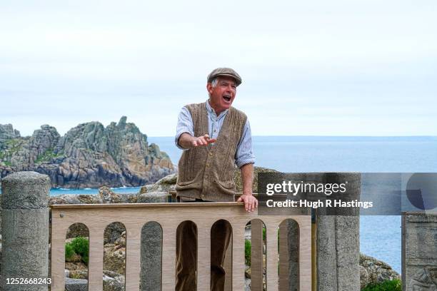 Actor Mark Harandon rehearsing alone at the open air Minack Theatre set in to the cliffs at Porthcurno, on June 26, 2020 in Cornwall, United Kingdom....