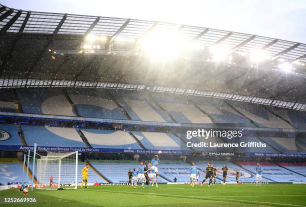 General view of play in front of empty stands during the Premier League match between Manchester City and Arsenal FC at Etihad Stadium on June 17,...