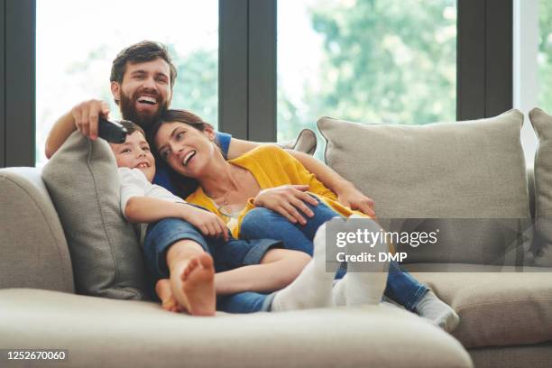 get comfy, it's family movie time - binge watching stock pictures, royalty-free photos & images