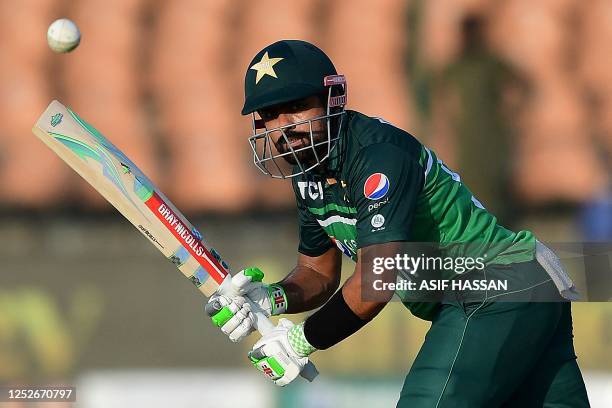 Pakistan's captain Babar Azam plays a shot during the fourth one-day international cricket match between Pakistan and New Zealand at the National...