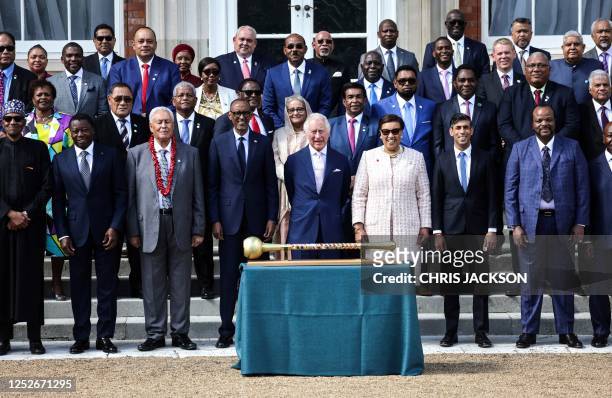 Britain's King Charles III , flanked by Rwanda's president Paul Kagame , Secretary General of the Commonwealth Patricia Scotland and Britain's Prime...