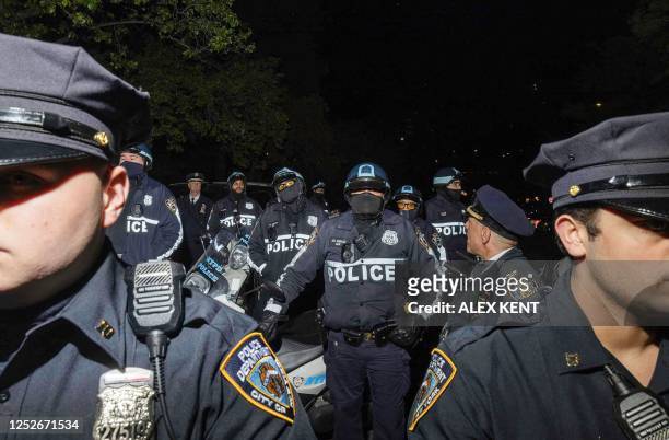 Police prepare as protestors gather at Barclays Center Arena and march to the 7th police precinct to protest the New York Police Department response...