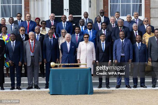 Britain's King Charles III and British Prime Minister Rishi Sunak pose for a group photo with Commonwealth Leaders at Marlborough House on May 5,...