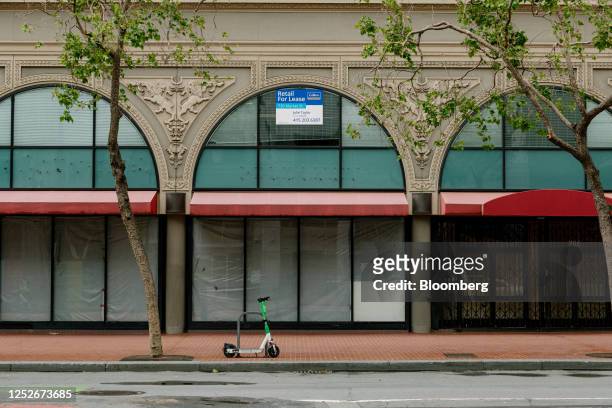 For Lease" sign at a storefront on Market Street in San Francisco, California, US, on Wednesday, May 3, 2023. San Francisco's office-vacancy rate...