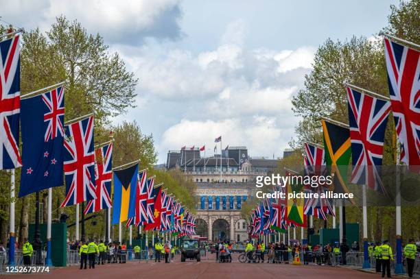 May 2023, Great Britain, London: The street "The Mall" between the Admiralty Arch and Buckingham Palace is closed to passers-by and is being prepared...