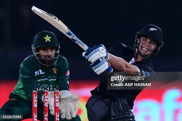 New Zealand's Mark Chapman plays a shot during the fourth one-day international cricket match between Pakistan and New Zealand at the National...