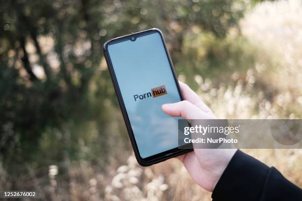 In this photo illustration a PornHub logo seen displayed on a smartphone screen in Athens, Greece on May 5, 2023.