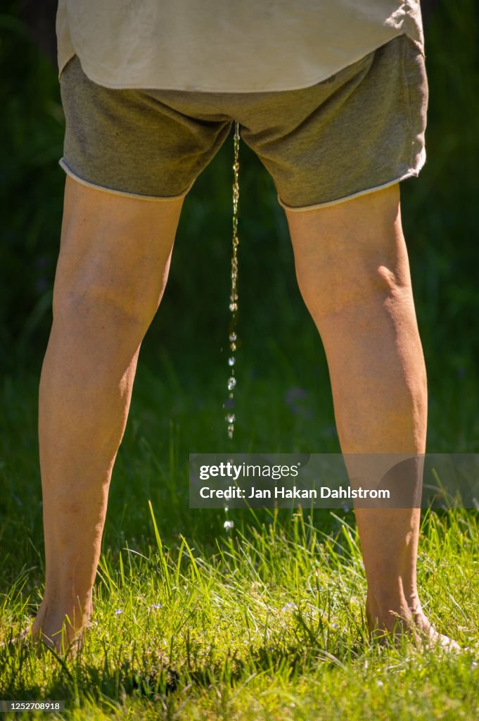 Rinating Urinating Man High-Res Stock Photo - Getty Images