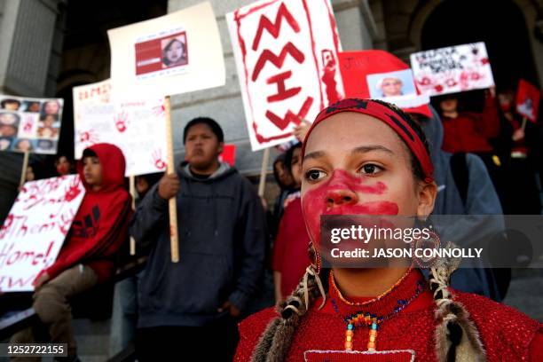 Evelynn Ware of the Oglala nation, a student at the American Indian Academy of Denver, participates in a student-led rally in support of Missing or...