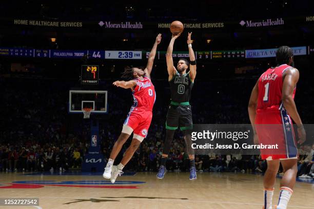Jayson Tatum of the Boston Celtics shoots a three point basket during Round 2 Game 3 of the Eastern Conference Semi-Finals 2023 NBA Playoffs against...