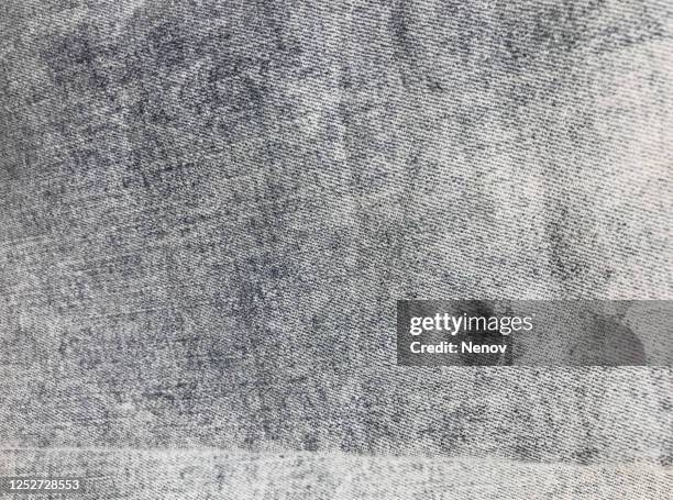 close-up of jeans texture background - lavato con acido foto e immagini stock