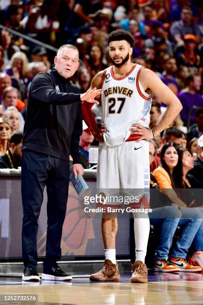 Head Coach Michael Malone of the Denver Nuggets talks to Jamal Murray during Game 3 of the 2023 NBA Playoffs Western Conference Semi-Finals against...