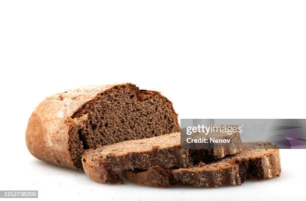 fresh black sliced bread on white background - pan fotografías e imágenes de stock