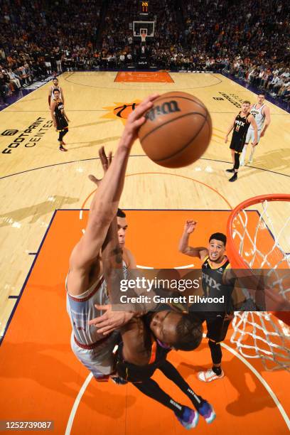 Michael Porter Jr. #1 of the Denver Nuggets dunks the ball during Game Three of the Western Conference Semi-Finals of the 2023 NBA Playoffs against...