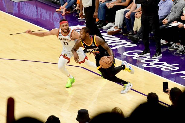 Terrence Ross of the Phoenix Suns dribbles the ball during Game 3 of the 2023 NBA Playoffs Western Conference Semi-Finals against the Denver Nuggets...