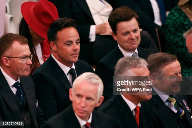 British television presenting duo Ant and Dec sit as guests wait during the Coronation of King Charles III and Queen Camilla on May 6, 2023 in...
