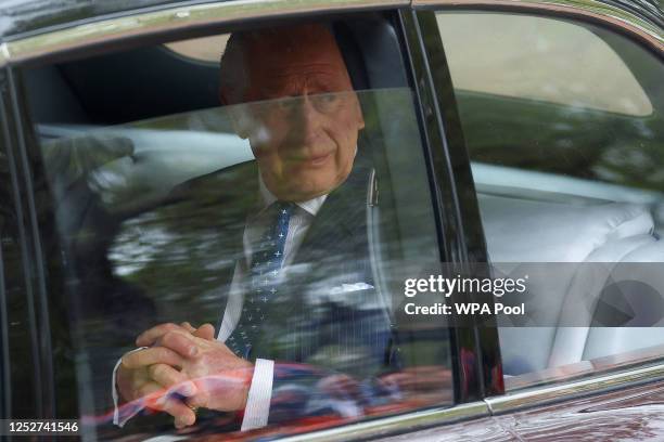 King Charles III leaves St James' Palace in a car ahead of his and Queen Camilla's coronation on May 6, 2023 in London, England. The Coronation of...