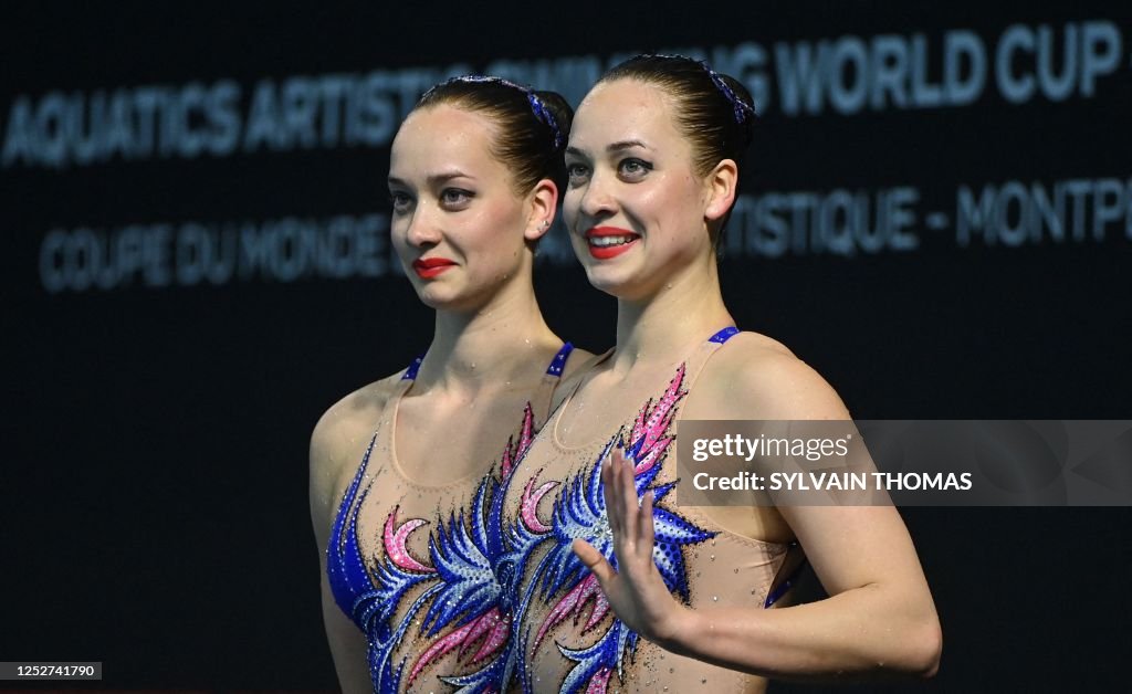 Ukraine's Maryna Aleksiiva and Vladyslava Aleksiiva compete in the