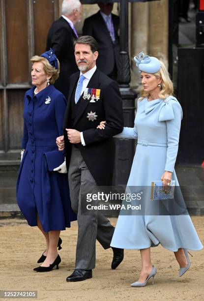 Queen Anne-Marie of Greece, Crown Prince Pavlos of Greece and Marie-Chantal, Crown Princess of Greece arrive to attend the Coronation of King Charles...