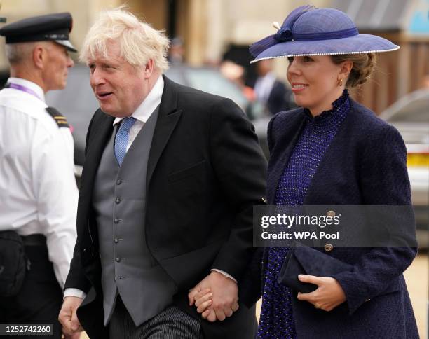 Former prime minister Boris Johnson and his wife Carrie Johnson arrive at the Coronation of King Charles III and Queen Camilla on May 6, 2023 in...