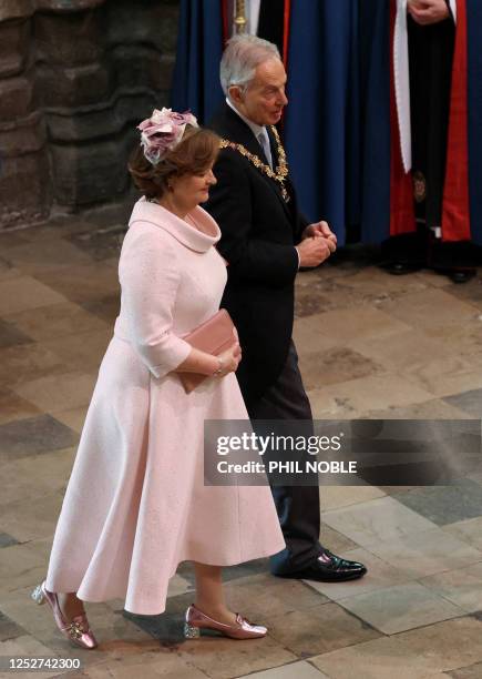 Former British Prime Minister Tony Blair and his wife Cherie Blair arrive at Westminster Abbey in central London on May 6 ahead of the coronations of...