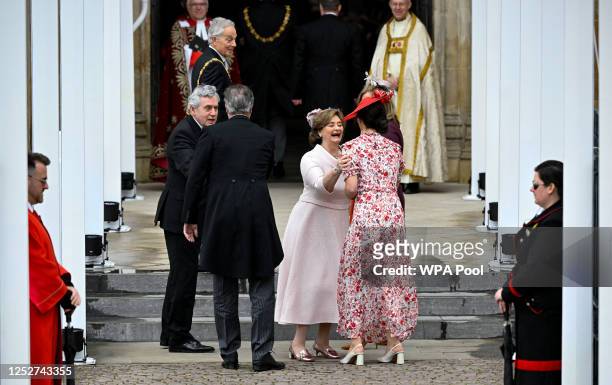 Former British Prime Minister Gordon Brown, Cherie Blair, former British Prime Minister David Cameron and his wife Samantha Cameron arrive to attend...