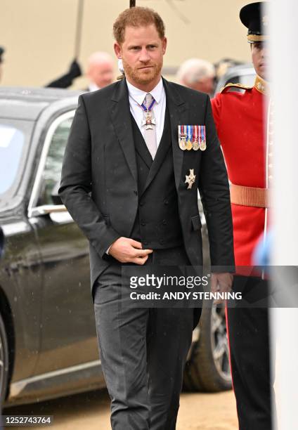 Britain's Prince Harry, Duke of Sussex arrives at Westminster Abbey in central London on May 6 ahead of the coronations of Britain's King Charles III...